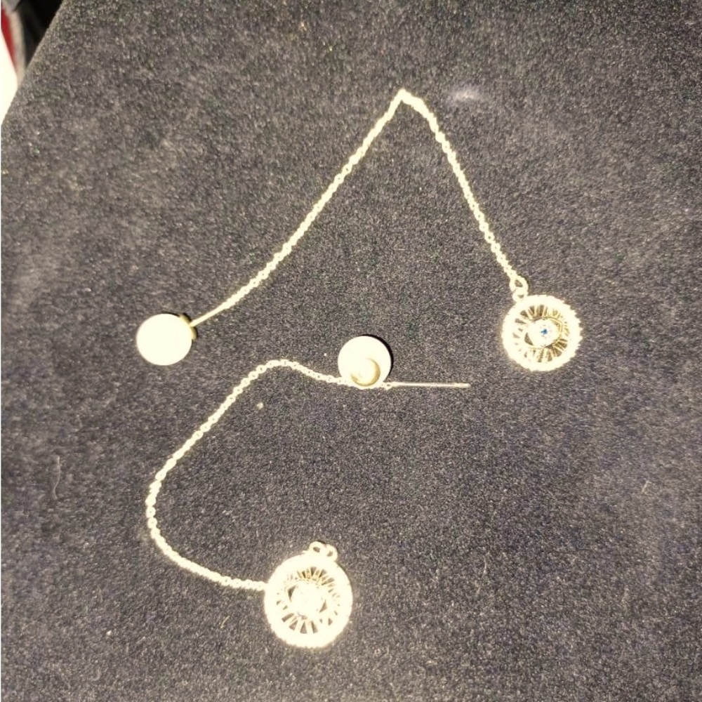 Earrings with a evil eye with  pearls very classic and elegant